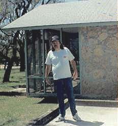 Billy in front of a camp cabin, Bandera, Texas, ca.1991