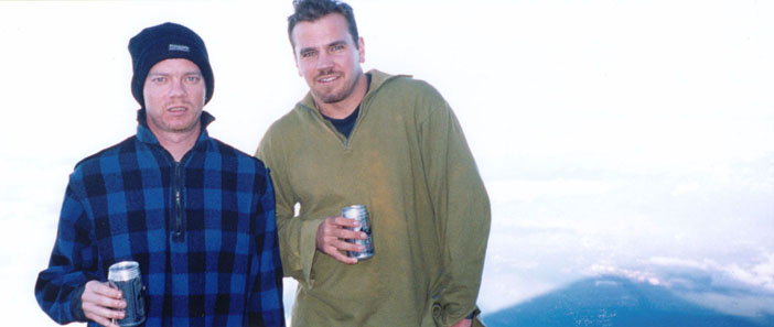 Me and dave on Fuji as the sun is going down. To the right you can see its shadow on the plains far below.