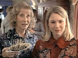 Bridget and her mum at the Turkey Curry Buffet. Bridget is dressed in clothes provided by her mum and looks quite terrible