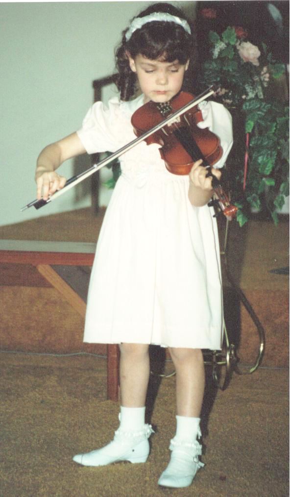 Rosie playing violin at Aunt Ruth and Uncle Zim's wedding