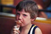 Boy eating Ice Cream. Link to the freeimages website below