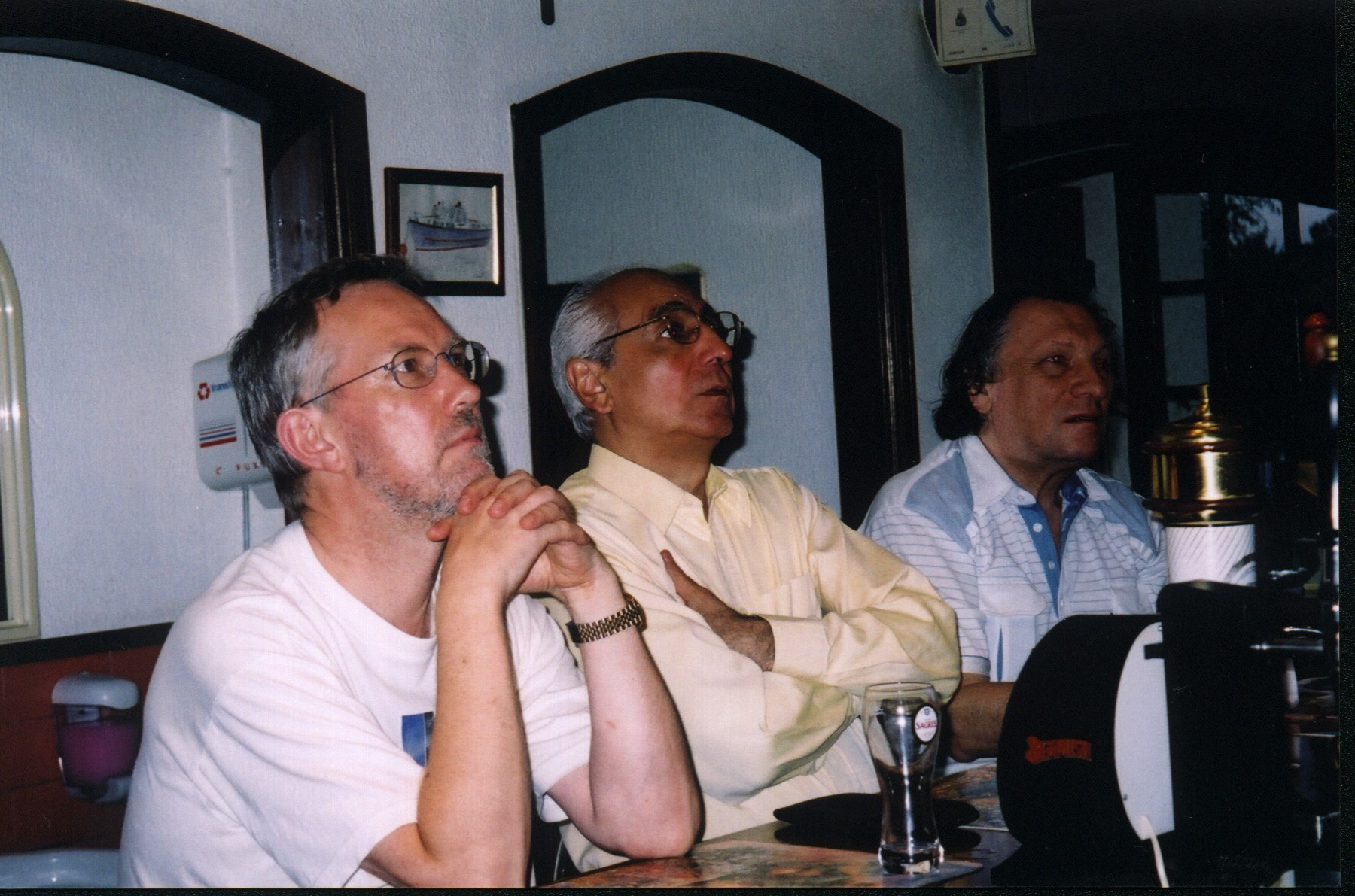 A Tough Life: glued to the Euro Cup Final with Martino Tirimo and Radoslav Kvapil (Aveiro Piano Festival 2004; photo by Nancy Harper)