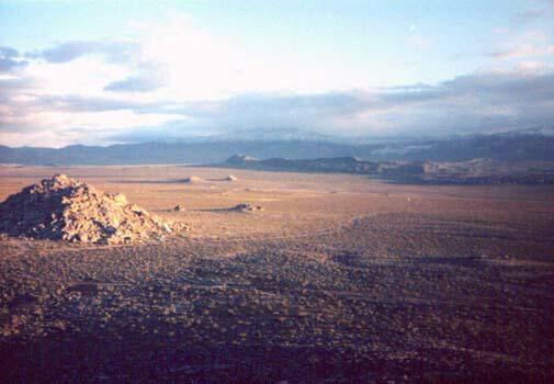 Desert floor at dusk,...25 kb picture loading