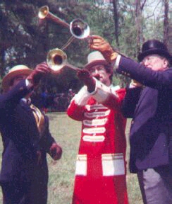 Three tootlers sound off on their horns.
