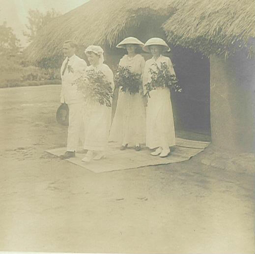 The bridal party leaves the Yambio church