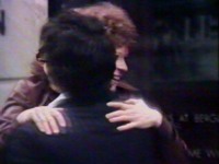 Couple hugs
