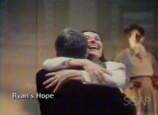 Johnny (Bernard Barrow) & Maeve (Helen Gallagher) Ryan hug.