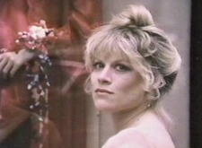 Delia Reid Ryan Coleridge (Ilene Kristen) shops on Fifth Avenue.