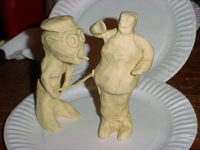 Is that guy peeing on the other one?