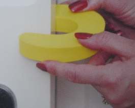 Door stopper, wraps around door and stops slamming and fingers jamming
