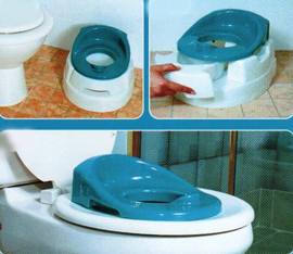 Multi Stage Potty by Dream Baby.  Can be used as a free standing potty while your child is first learning, and then attaches to the toilet seat for use later.