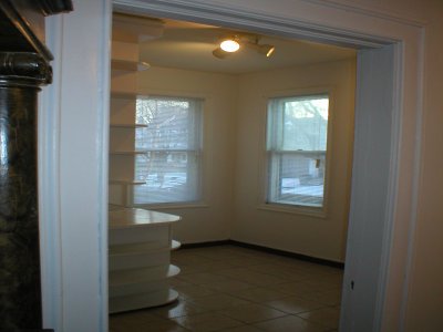 Extra large kitchen with appliances, lots of cabinets, ceramic tile floor and bright-sunny windows 