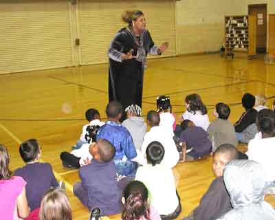 Saginaw Mayor Wilmer Jones-Ham paid a visit to the Christmas party and spoke to the kids
