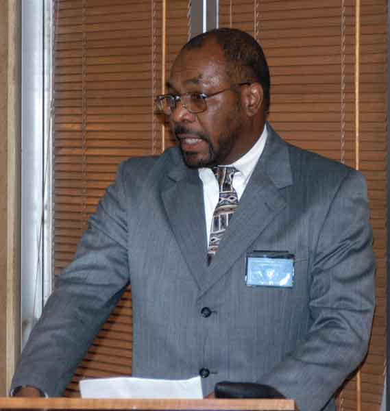Outgoing president, Lion JT Holmes gives thanks for members' efforts over the past year