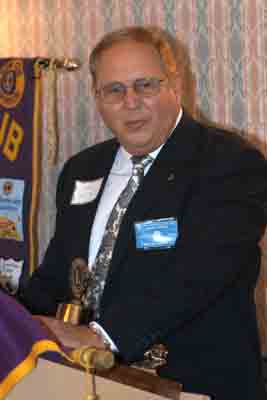 Past president Norm Moore, who did a masterful job of coordinating the meeting of the past presidents, speaks about some club history.