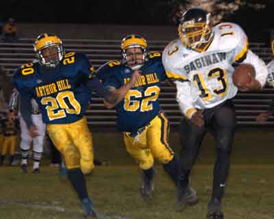 Saginaw High gains on Arthur Hill's defense on this play.
