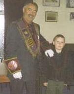 Grandfather and Grandson prepare to go on parade!