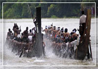 snake boats manned by 100 oarsman