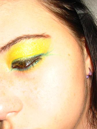 Sunnyside Up; MAC Electric Eel;liquid black and green eyeliner; mascara.