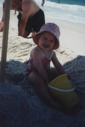 Emma plays in the sand