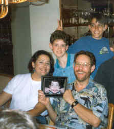 Dave holds photo of Calvin