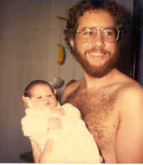 Dave holds Doug 1980