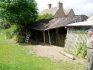 Nowhere near as bad as it was now grandad put up some posts to support it - that big post on the floor originally kept the roof UP, before some big hairy horse knocked it flying... fifty years that post has stood there!!