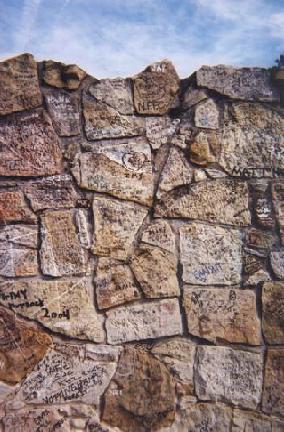 The stone wall of Graceland, along Elvis Presley Boulevard in Memphis, Tennessee, where fans can leave their messages for Elvis.