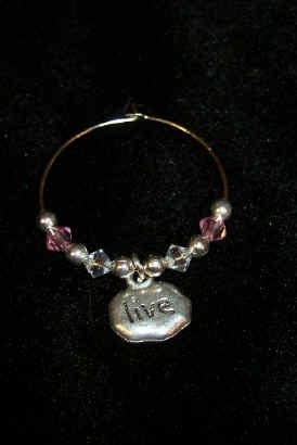 Live charm.jpg (74021 bytes)