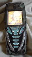 my 7210 with a black transparent cover and squeeky the chihuahua as wallpaper