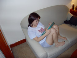 my baby figuring what word to use next for scrabble