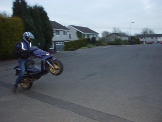Wheelie on a scooter