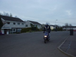 Walsh riding his scooter
