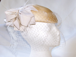 #22 Peach pillbox with cream veil and bow (used); $5