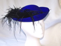 #25 Royal blue felt with black feathers by Shumi (used); $5