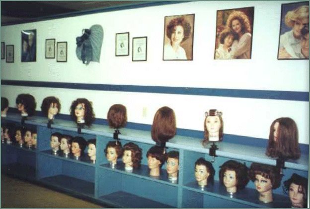 Human hair manikins are used to learn the skills of the trade.