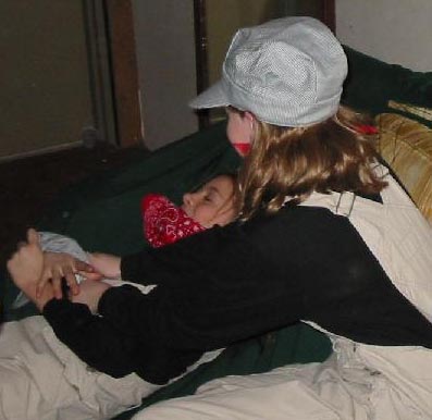 Kristen tickling Katie...