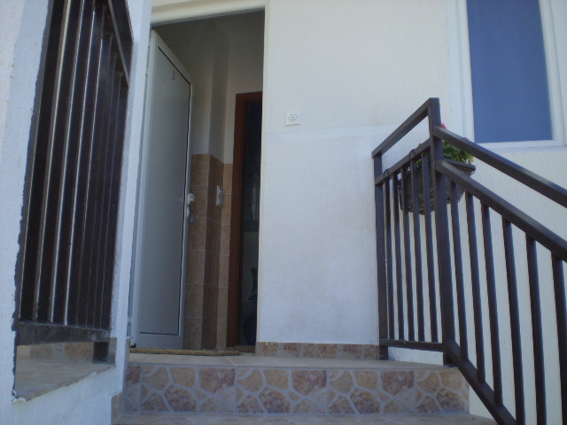 In front of apartment