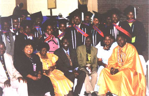 Recent Graduates with some faculty members