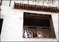 Cracked and decaying, the watchtowers stand like silent sentinels 