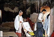 Inside, artists sketch the buildings for an exhibition 