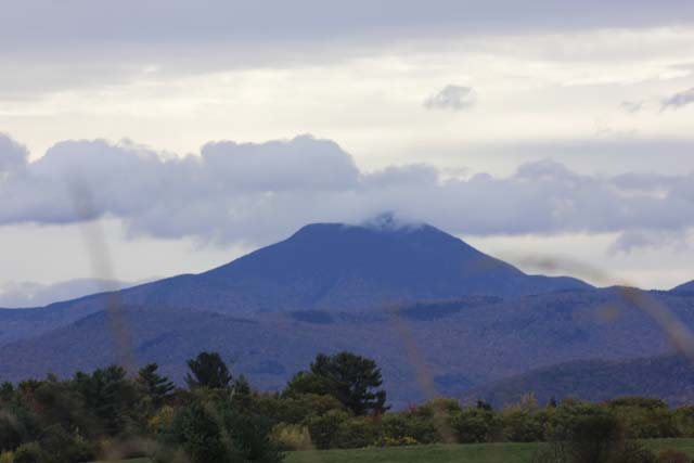 Mountain with clouds at the peak