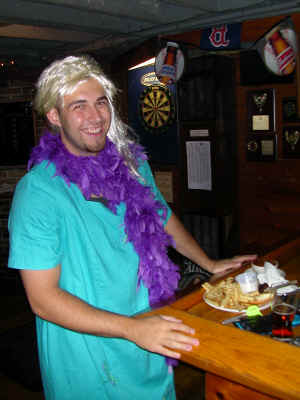 Jay, now in the Army, lost a bet to John and had to wear a dress to a match.