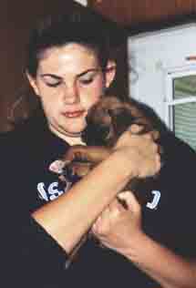 Elisabeth holds baby Scrapper