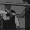 Later in the evening...Here I am cutting a slick deal with the BBC's Roger Ferarri.