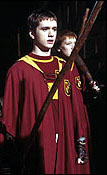 Wearing his Quiddich robes.