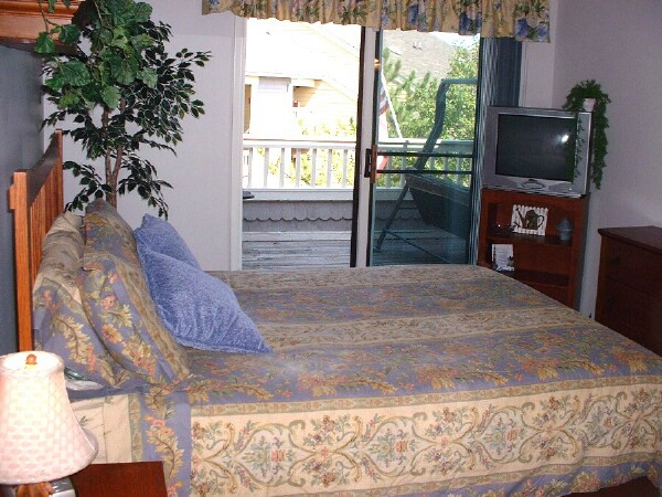 Mahagony Master Bedroom has private Balcony Access