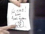 chris displays a badly spelled autograph from Frank Sinatra