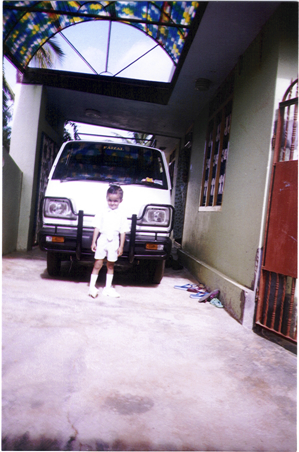 Go Faizal in School uniform in front of Car