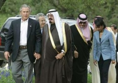 US President George W. Bush arm in arm with Saudi Prince Abdullah